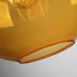 Moderne Pendelleuchte aus Glas mit rundem, bernsteinfarbenem Glasschirm im Blasendesign
