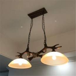 2-flammige schwarze rustikale künstlerische Retro-Pendelleuchte im Geweih-Stil mit Glasschirm